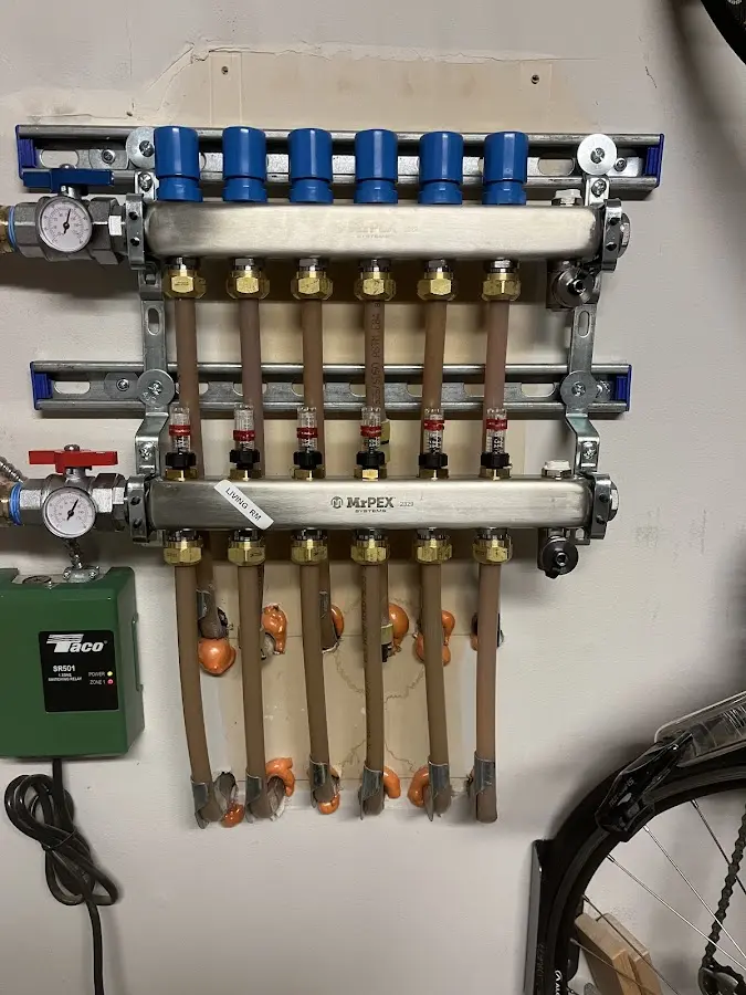 Plumber performing Leak Detection at a residential property in Greenfield